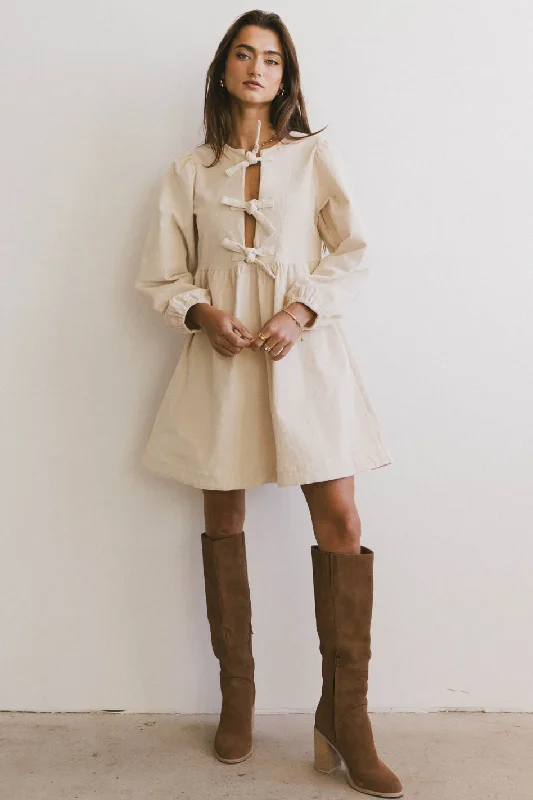 Tyler Peplum Mini Dress in Ivory Corduroy Chic Pleated Mini Dress